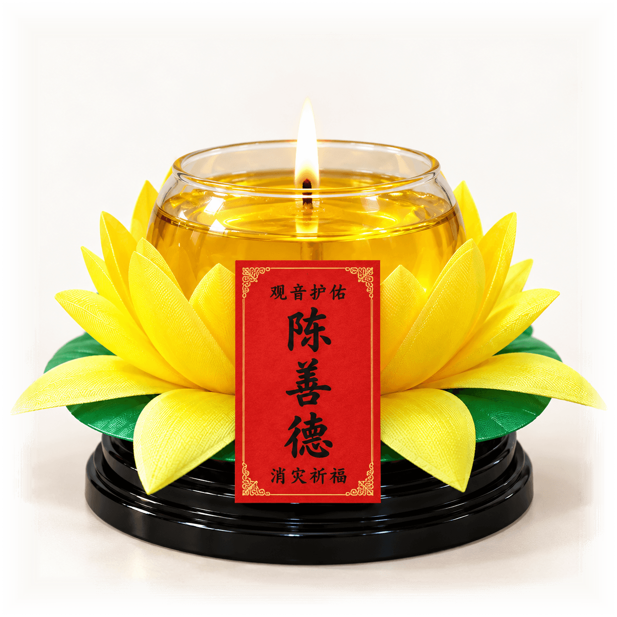 A lit lotus candle with a red name label on its base